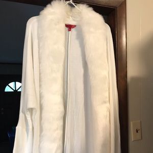 This is a JLo faux fur poncho